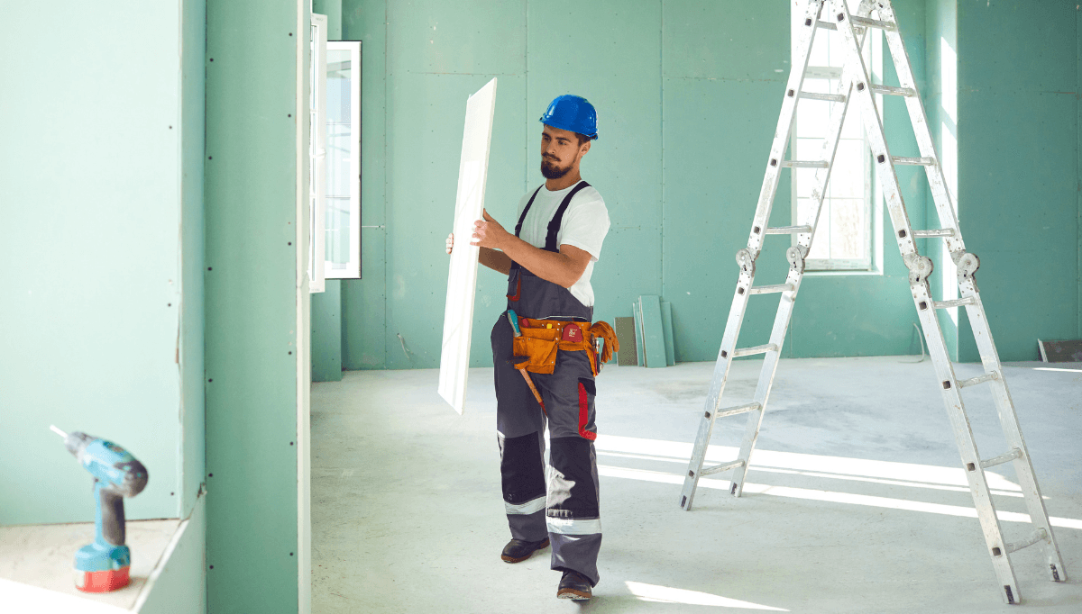 Painter cutting in on a residential interior repaint